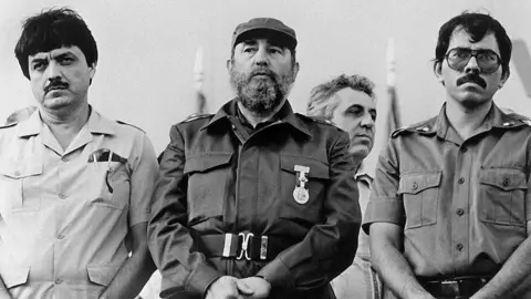 AFP Cuban President Fidel Castro (C) poses with Nicaraguan President Daniel Ortega (R) and Nicaraguan vice-president Sergio Ramirez, on January 11, 1985, during the inauguration of the "Victoria de Julio" sugar mill in Managua.