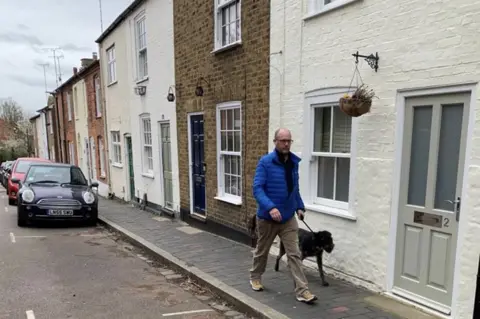 Jim Hodgkins Jim and Heidi walking in St Albans