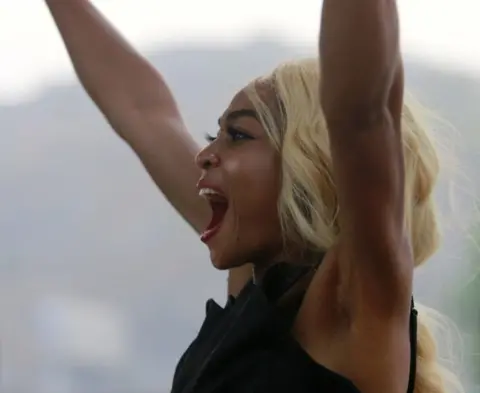 Reuters Nigerian football fan cheering