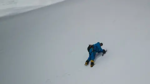 Bartek Bargiel Rick Allen in footage from the drone