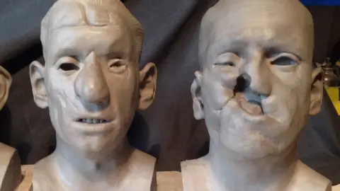 Matthew Healey Sculptures of people with facial injuries