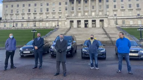 BBC Taxi drivers met with Infrastructure Minister Nichola Mallon to discuss a financial support package