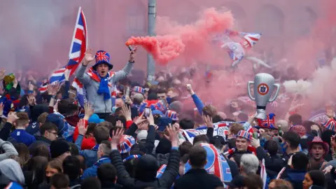 Reuters supporters outside Ibrox
