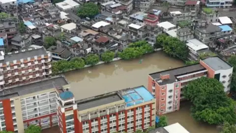 FUZHOU FIRE DEPARTMENT flooding following heavy rainfall brought by Typhoon Talim, in Fuzhou, Fujian province, China