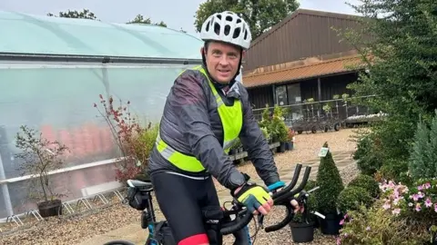 Jenny Langley Hugh Langley on his bike