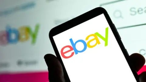 An eBay logo on a phone