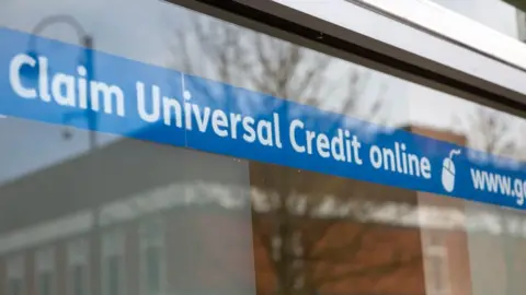 Getty Images Claim Universal Credit online banner message in window in Wiltshire