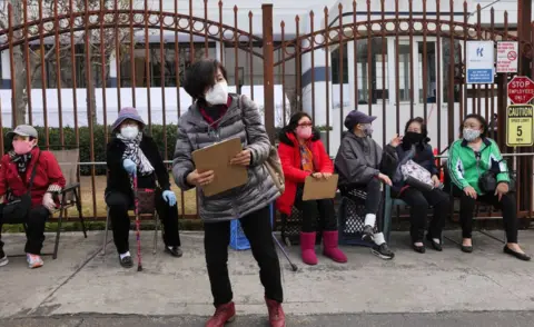 Getty Images Californians queue for vaccine