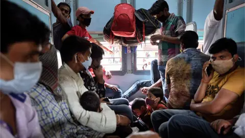 Hindustan Times Migrants on board a train from Mumbai to Varanasi on April 9, 2021 in Mumbai, India.