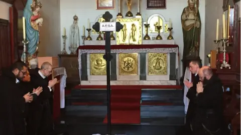 BBC Monks praying