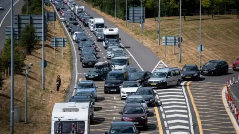 Getty Images Traffic on approach to the Eurotunnel terminal in Kent on 28 July 2018