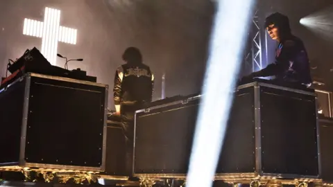 Getty Images Augé and his Justice bandmate Xavier de Rosnay (right) performing in Berlin in 2017