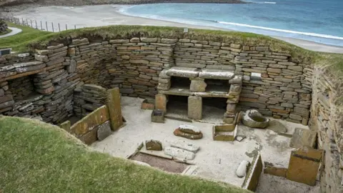 Catherine Mackinnon visited Skara Brae in a windswept Orkney today. I is an amazing insight into how people lived 4500 years ago and has been designed a World Heritage Site.