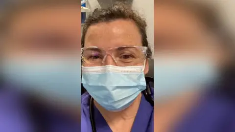 Libby Nolan Libby Nolan wearing facemask