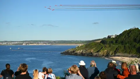 Getty Images Red Arrows flying over Carbis Bay, Cornwall