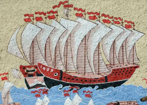 Alamy  A painting of one of Admiral Zheng He's ships on the wall of the Chinese Temple Shrine Penang, Malaysia