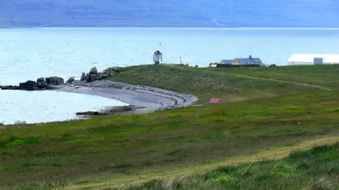 Fingalo/Wikimedia Commons Vigur shoreline, with windmill