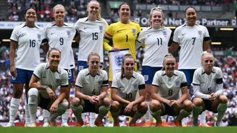 Getty Images England players lining up before the draw with Portugal in their final warm-up match