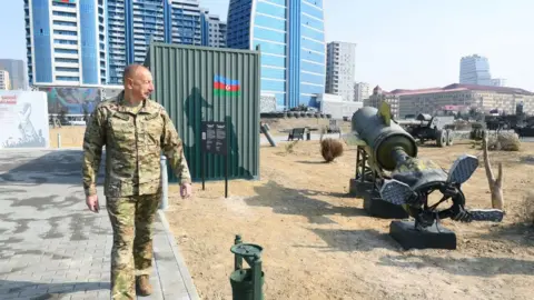 Azerbaijani Presidency/ Handout President Ilham Aliyev is seen during the opening ceremony of Spoils of War Museum