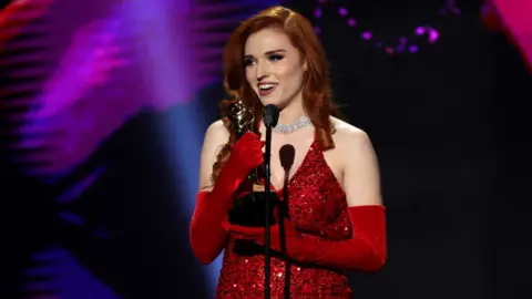 Getty Images Amouranth accepting an award