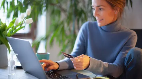 Getty Images Woman shopping online