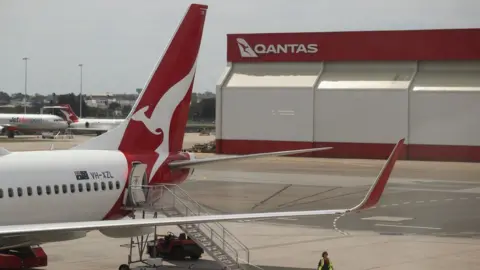 Reuters A Qantas flight at an airport