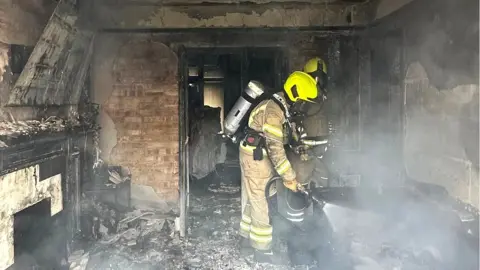 Essex Fire Service Fire fighters tackling blaze