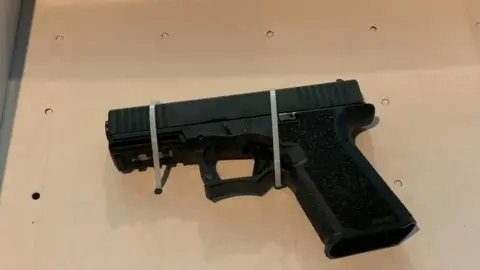 AFP A glock pistol