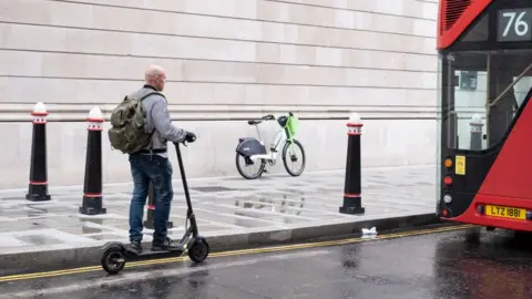 Getty Images Man on private e-scooter