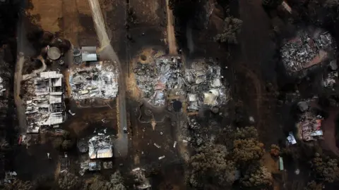 Getty Images An aerial view of a row of houses in Kinglake shows houses destroyed