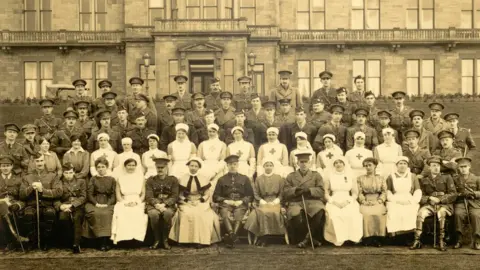Edinburgh Napier University Staff and patients in front of Craiglockhart War Hospital, March 1917