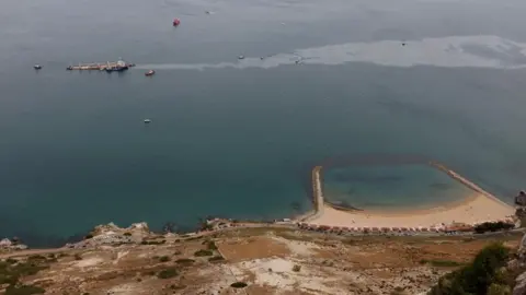 Gibraltar collision: Race to remove fuel from stricken ship