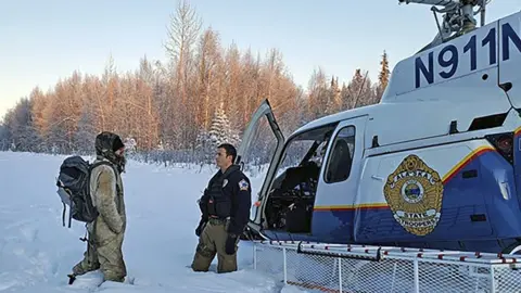 AFP PHOTO / ALASKA STATE TROOPERS Alaska authorities rescue Tyson Steele