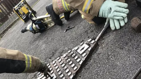 RSPCA Fire crews removing drain