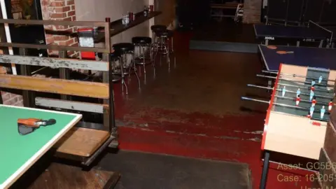 Court filing He abandoned his two guns as police closed in, and left his pistol on a table in the game room