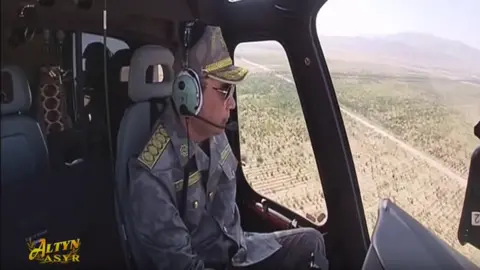Turkmen TV Turkmen President Berdimuhamedow pilots helicopter, June 2019