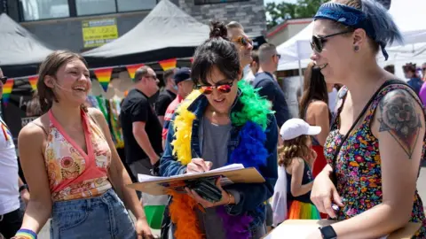 Reuters Volunteers gather signatures