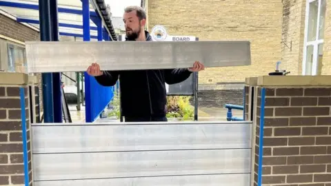 Flood defences installed at Burnley Road Academy primary school in Mytholmroyd