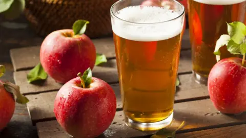 Getty Images Cider and apples
