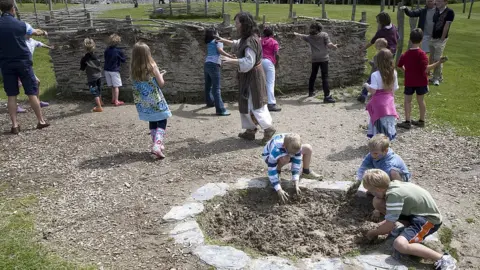 Getty Images Children play at Castell Henllys