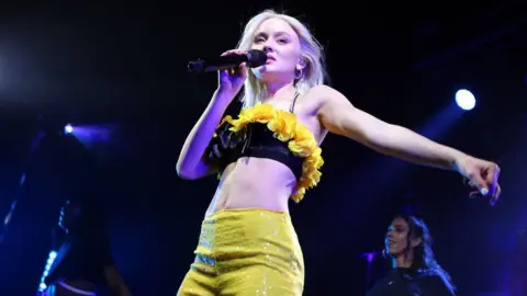 Getty Images Zara Larsson on stage in Brixton, London