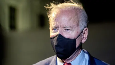 EPA US President Joe Biden speaks to the press on the South Lawn of the White House upon returning from Ohio, in Washington DC, USA, 23 March 2021