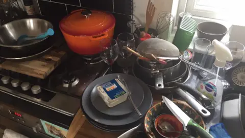 Washing up piling up in a kitchen in Streatham, south London