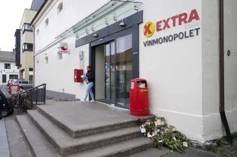 EPA The grocery store Coop Extra in Kongsberg where the suspect carried out part of the attack reopened early on 18 October 2021