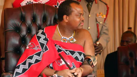 AFP Swaziland's King Mswati III attends the launch of a campaign calling for his male subjects to get circumcised to curb the spread of HIV infection, 15 July 2011