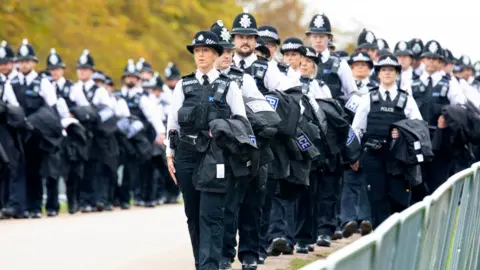 EPA-EFE/REX/Shutterstock Police officers