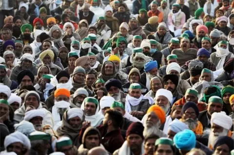 Reuters Farmers take part in a protest against farm bills passed by India's parliament at Delhi-Uttar Pradesh border on the outskirts of Delhi, India, December 17, 2020.