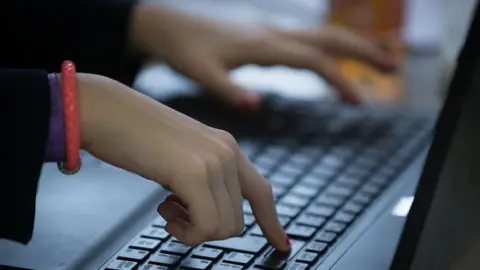 Getty Child on computer