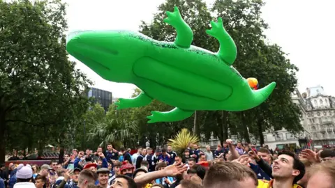PA Media fans in Leicester Square on Friday