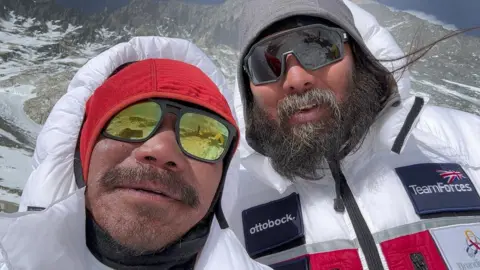 Hari Budha Magar Hari Budha Magar (left) and Krish Thapa